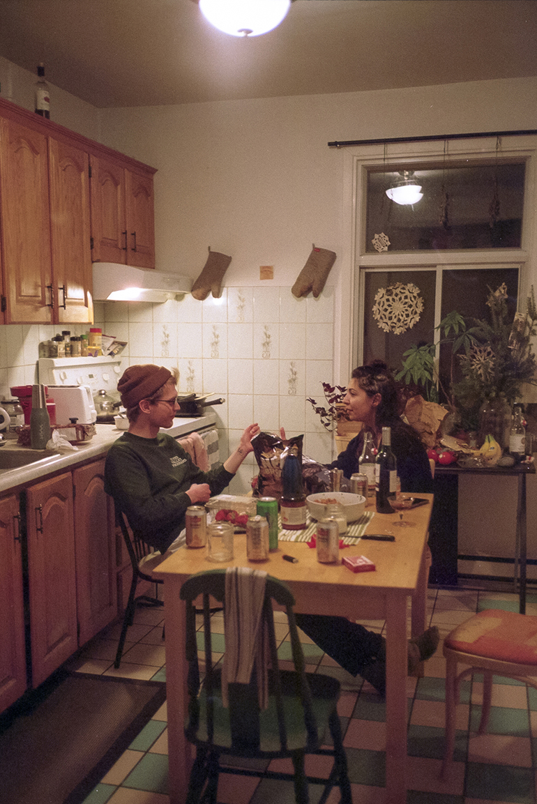 two people at a kitchen table