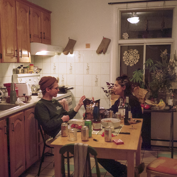 two people at a kitchen table