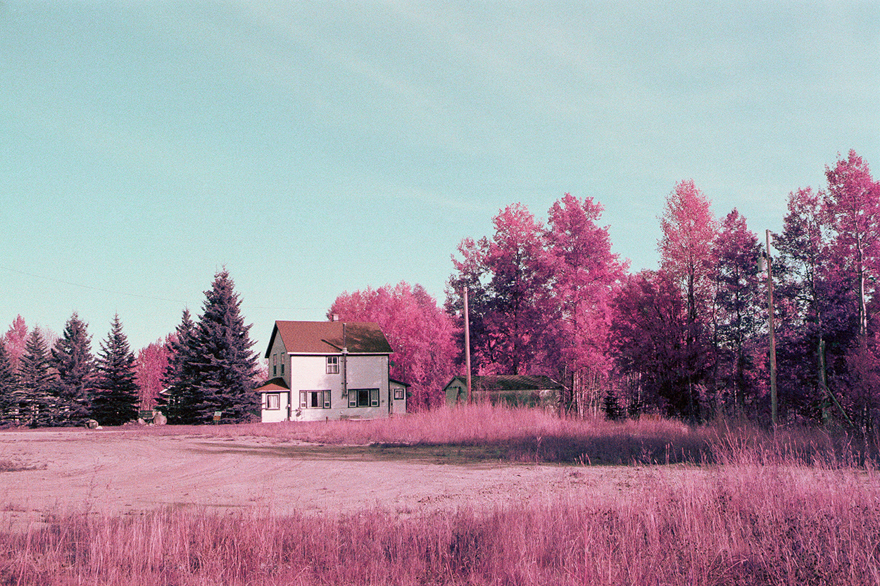 prairie field with house